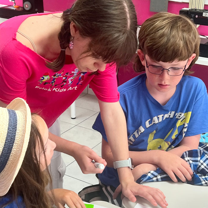 Kids learning how to paint